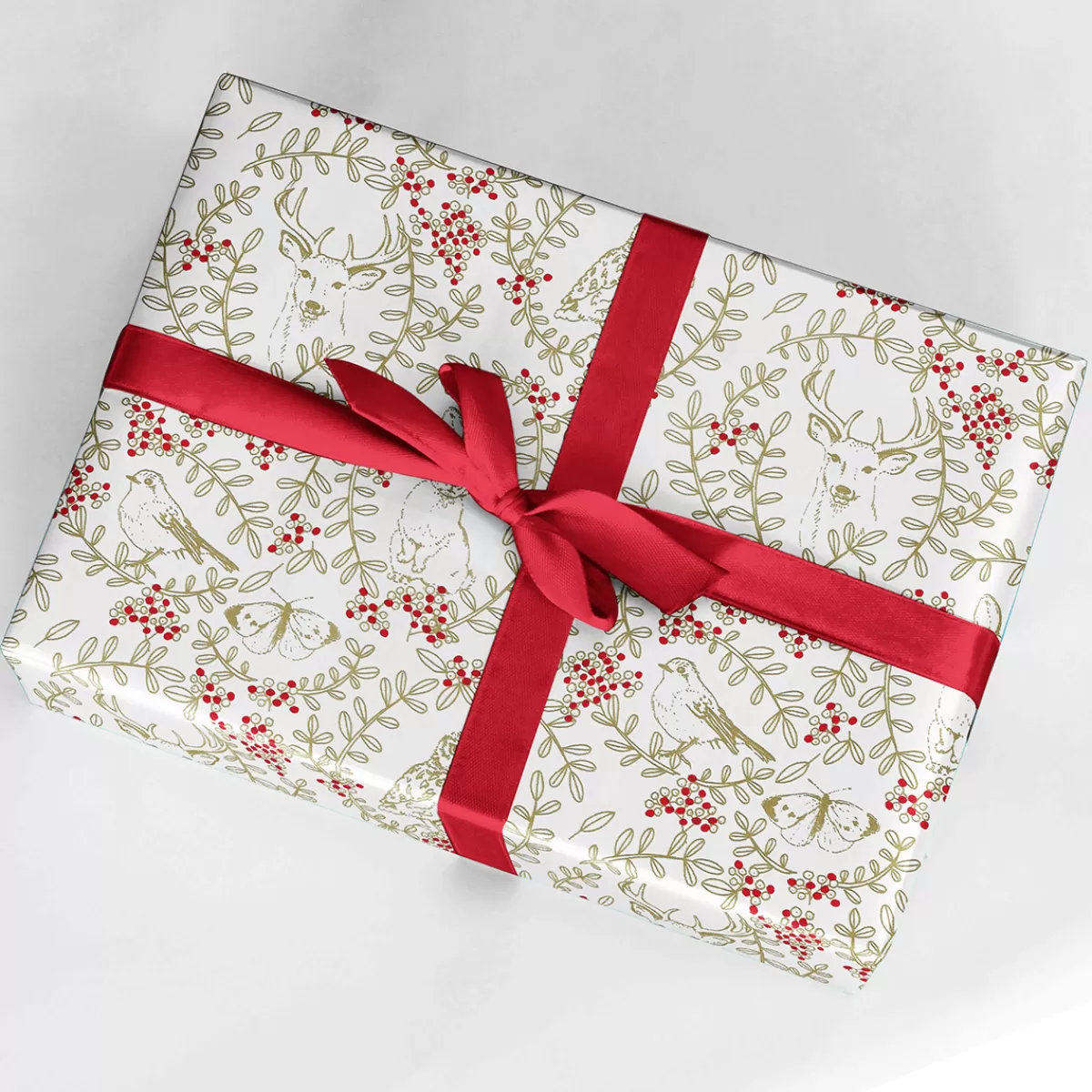 DecoWoerner Papier Cadeau Durable Avec Animaux De La Forêt, Rinceaux Et Baies Rouges - Rouleau De 50 M De Papier Cadeau